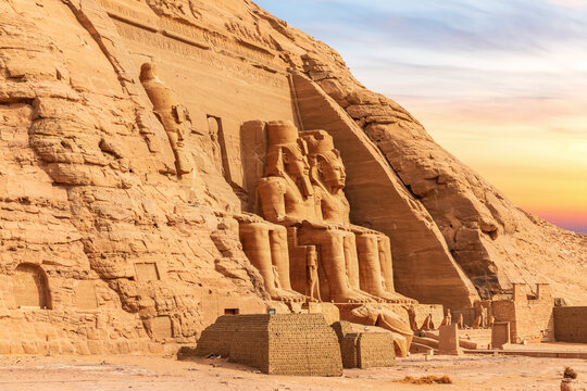 Abu Simbel, Egypt, view of the Great Temple's colossal statues, sunset light