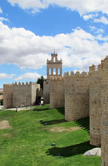 Fototapeta na wymiar Front view of La Espadaña and part of the wall of Ávila, in Spain.