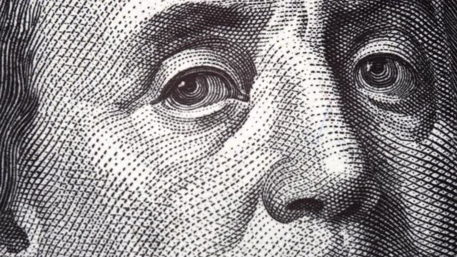 US President on one hundred dollar bill stop motion, zoom effect, close-up 