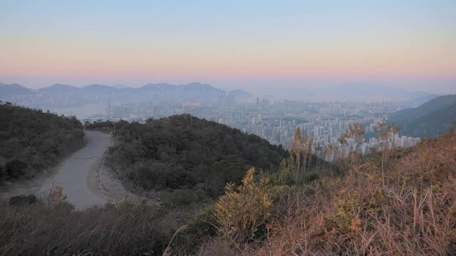 4K Timelapse high angle view of Beautiful misty morning landscape at Kowloon Peak, Hong Kong
