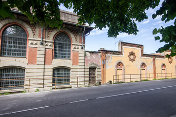 Fototapeta na wymiar Crespi d'Adda, a historic settlement in Lombardy, Italy, great example of 19th-century company towns in Europe. World Heritage Site