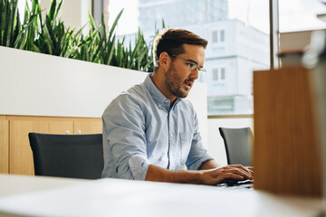 Freelancer doing work on computer