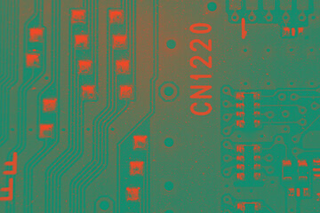 Close up on Electrical pathways in Circuit board, in abstract colors.