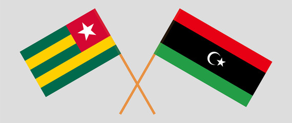 Crossed flags of Togo and Libya. Official colors. Correct proportion