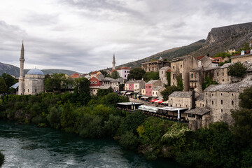Fototapeta na wymiar Breathtaking view of the old city centre of Mostar from Stari Most. Mostar, Bosnia and Herzegovina.