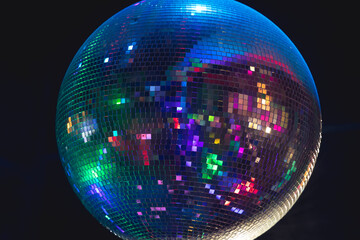 Shining disco ball in a discotheque