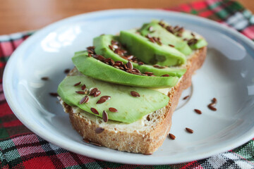 sandwich with green avocado and flax seeds vegetables breakfast