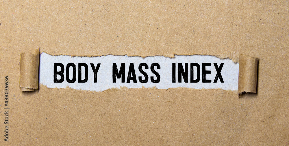 Poster bmi as body mass index text written on notebook page, red pencil on the right.