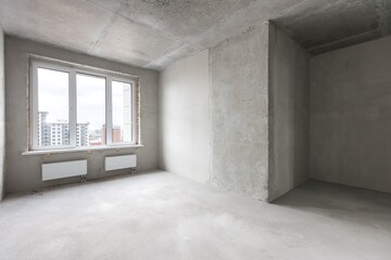interior of the apartment without decoration in gray colors