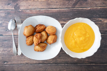 Nigerian Deep Fried Akara beancake served with Custard