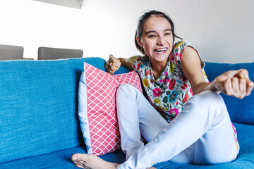portrait of latin disabled girl with cerebral palsy smiling at Home in disability concept in Latin America - obrazy, fototapety, plakaty