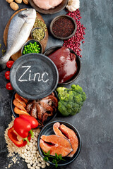 Food high in zinc on dark background. Healthy eating concept.