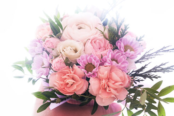 Beautiful bouquet of mixed different flowers in hand on white isolated background, greeting, gift