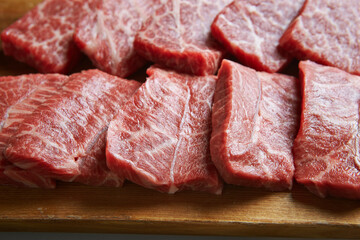 raw meat on a cutting board
