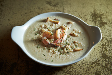 Seafood cream risotto on a plate