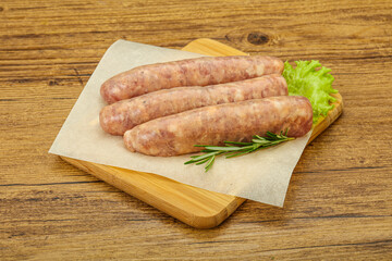 Raw pork meat sausages for grill