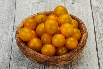 Fresh yellow cherry tomato heap