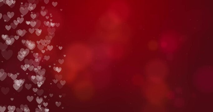 4k Seamless looped video. Border of romantic pink glittering flying hearts on blured background. Empty space for text