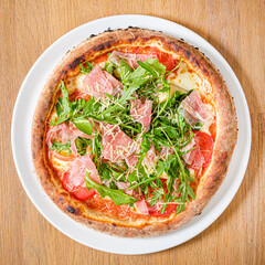 italian pizza on the wooden background