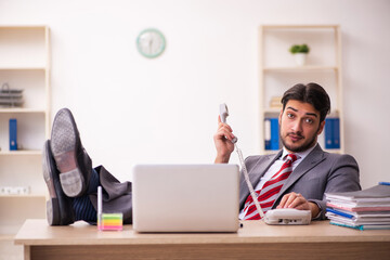 Young businessman employee working in the office