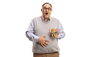 Mature man with a salad holding his belly