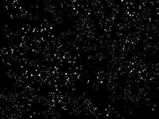 Abstract dust particle on dark background.