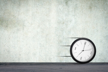 Clock in a car wheel, rolls along the road. Time concept.Copy space. Business. Lifestyle.
