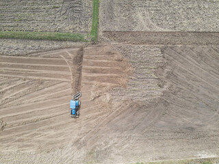 Aerial photograph of tractor working outdoors.