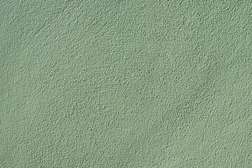 Semi gloss green cement texture.  An earth tone color and touch make a blend of nature feeling in modern habitat. Cool and calm wallpaper background.