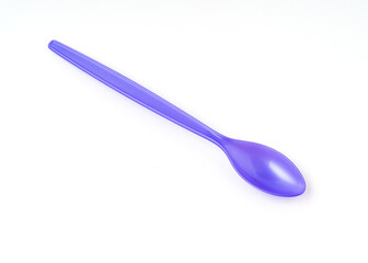 Blue color plastic spoon isolated on white background.