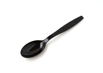 Black color plastic spoon isolated on white background.