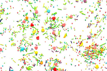 Bright background of multi-colored sweet sprinkles of different shapes in the form of hearts, stars, moon, flowers, round balls and sticks isolated.