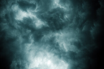 Thick dark black storm clouds covering summer sunset sky with gale-speed wind blowing just before Nor'westers Kalbaishakhi Bordoisila thunderstorm torrential rain. Atmospheric Texture background.