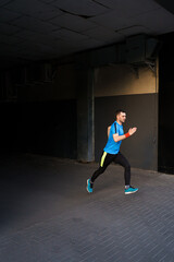 Man running in the city. Fitness workout, sport lifestyle concept