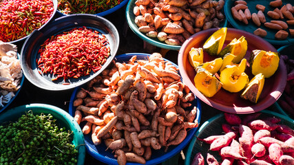 Various vegetables and fruits at a wet market.