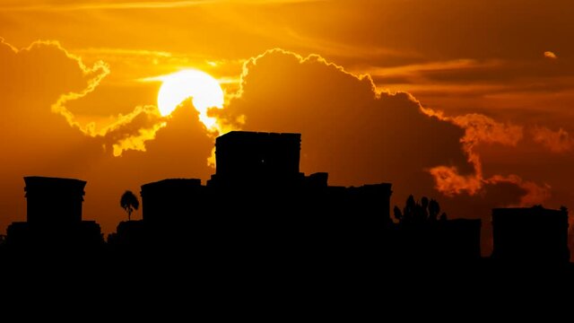 Mayan Pyramid of Tulum, Time Lapse at Sunset with Red Sun and Fiery Sky, Mexico