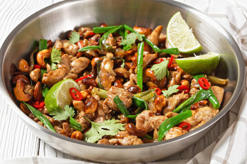 Thai cashew chicken stir fry in a pan