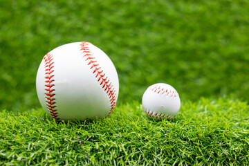 Baseball on green grass 