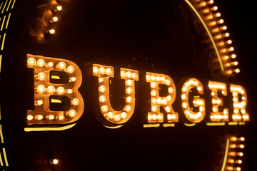 Interior burger pub signboard with light bulbs