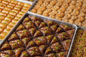 Turkish desert baklava with peanut, pistachio for holiday or ramadan. Traditional Middle Eastern Flavors. Selective focus, pattern.