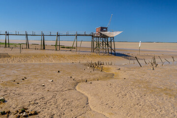 Mudflats at low tide on shores of Gironde estuary France on Atlantic coast of Charente Maritime