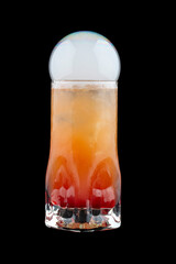 Smoke bubble orange cocktail on black background. Isolated