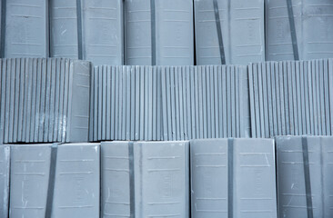 Stacked and arranged blue tiles background photo