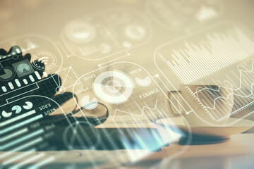 Fototapeta premium Double exposure of technology theme drawing and desktop with coffee and items on table background. Concept of high tech.
