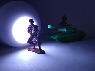 Plastic toy soldiers on white background - Miniature platic toy soldiers