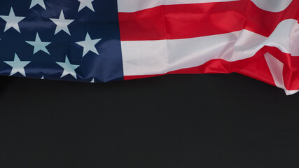 Flag of the United States of America (USA.) on black background.