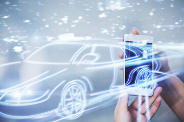 Double exposure of automobile icon hologram and woman holding and using a mobile device. Technology...