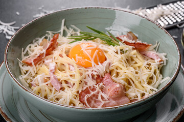 Pasta Carbonara. Spaghetti with bacon, egg, parsley and Parmesan cheese