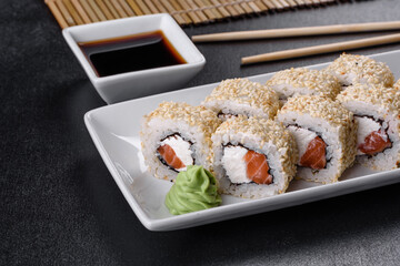 Sushi roll sushi with prawn, avocado, cream cheese, sesame. Sushi menu