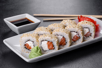 Sushi roll sushi with prawn, avocado, cream cheese, sesame. Sushi menu